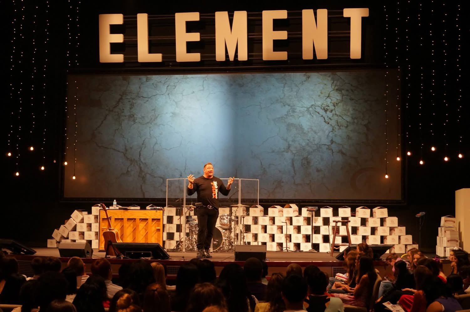 Duché Bradley on stage at a church event
