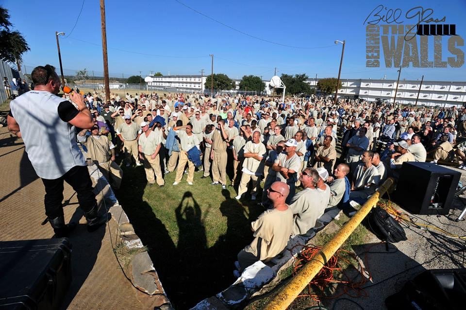 Huge outdoor crowd at a Behind the Walls prison event
